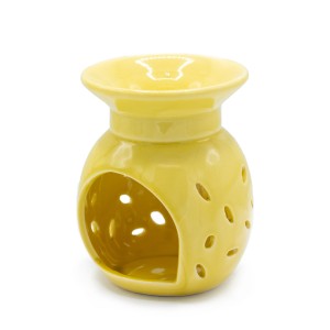 Żółty ceramiczny kominek zapachowy z kwiatowym wzorem